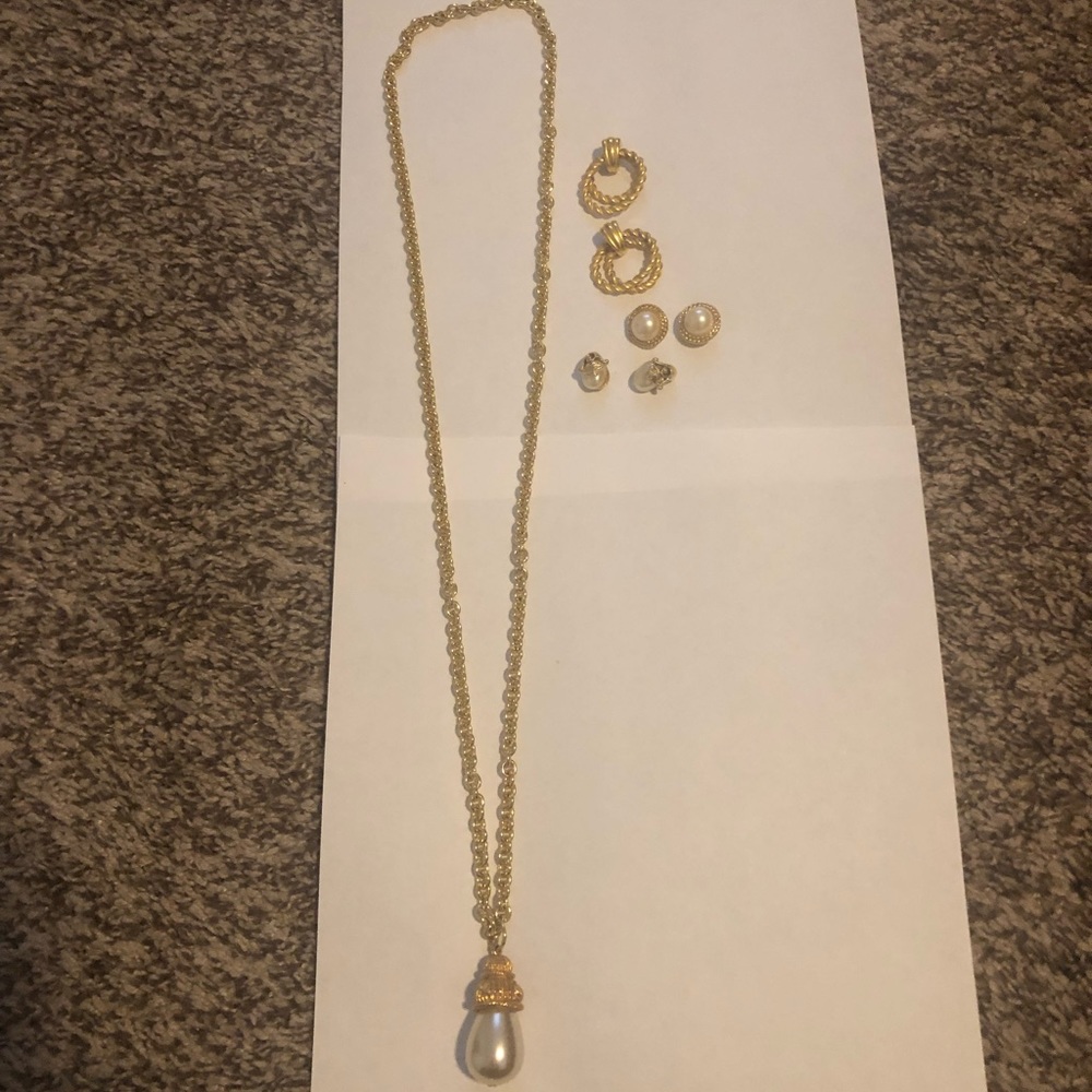 Gold tone necklace pearl pendant with 3 sets earrings.